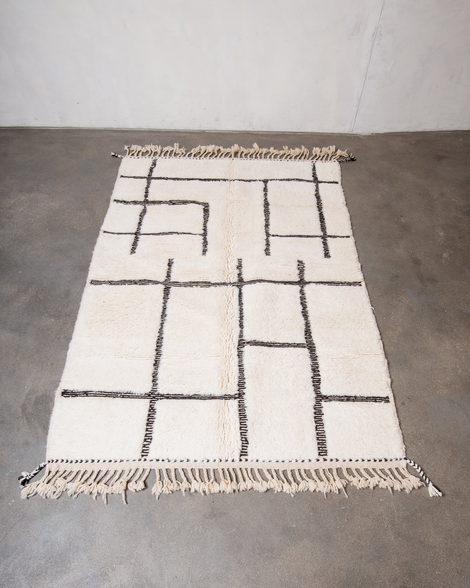 Modern, designer, handcrafted Berber rug from Morocco. Beniourain carpet with beautiful colours and patterns and fluffy wool texture.